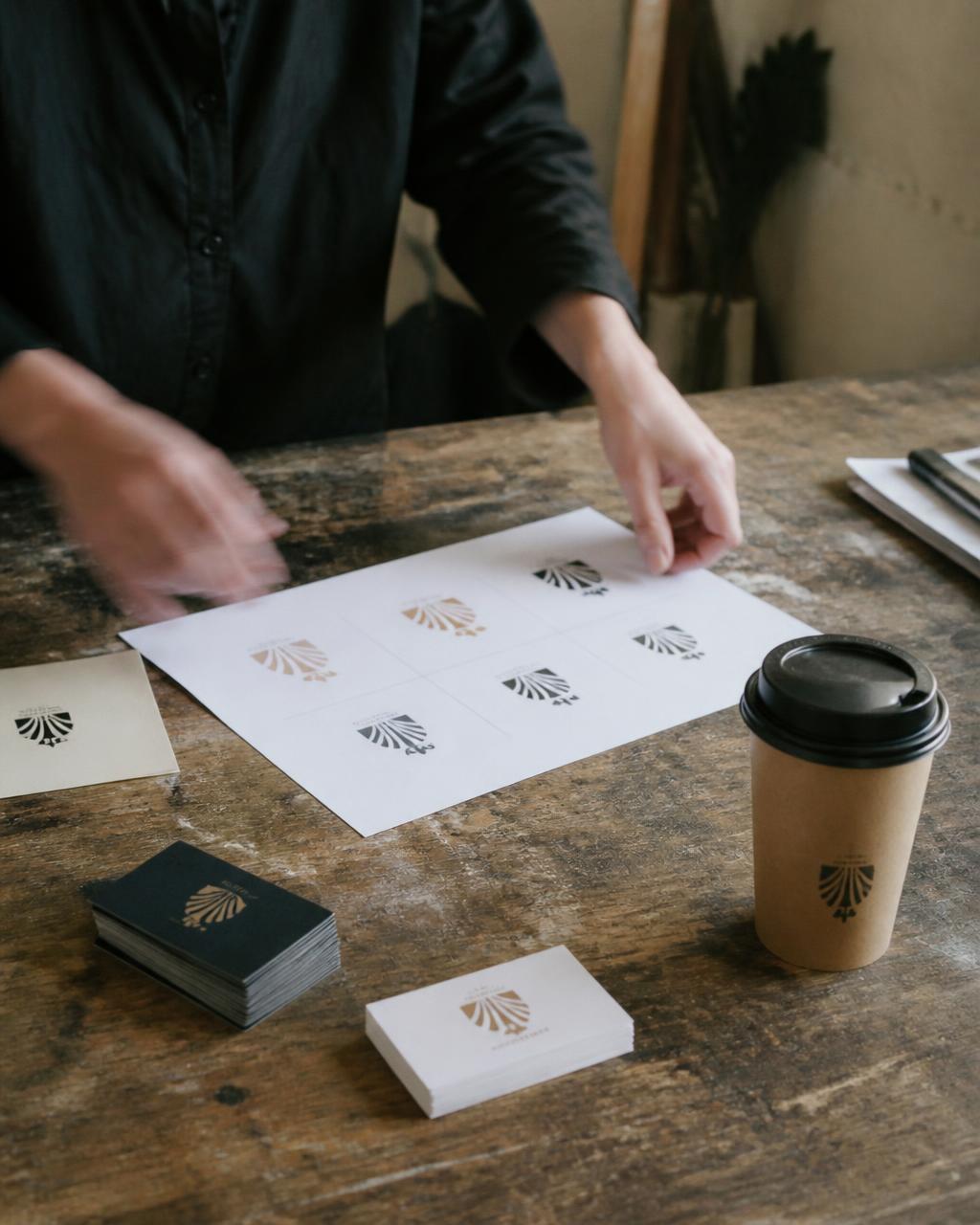 Brand identity system — logo cards, business cards, packaging and a polished social profile